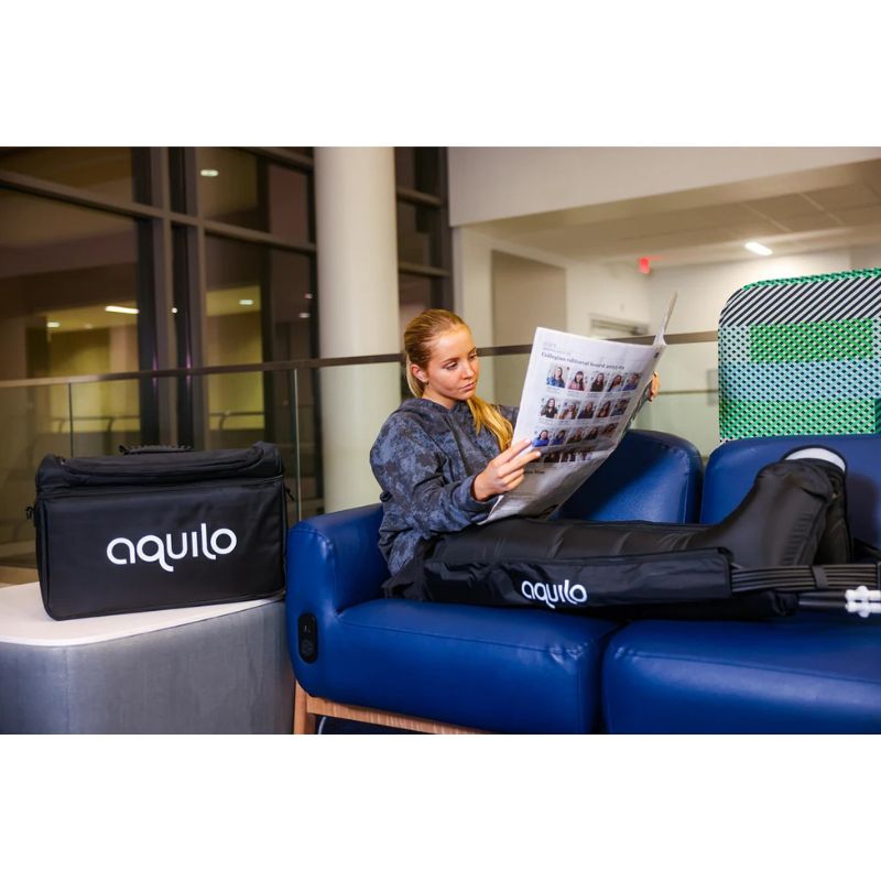 AquiloColdCompressionLegSleevesInBlackColourwithFemaleAthleteUsingItIndoor