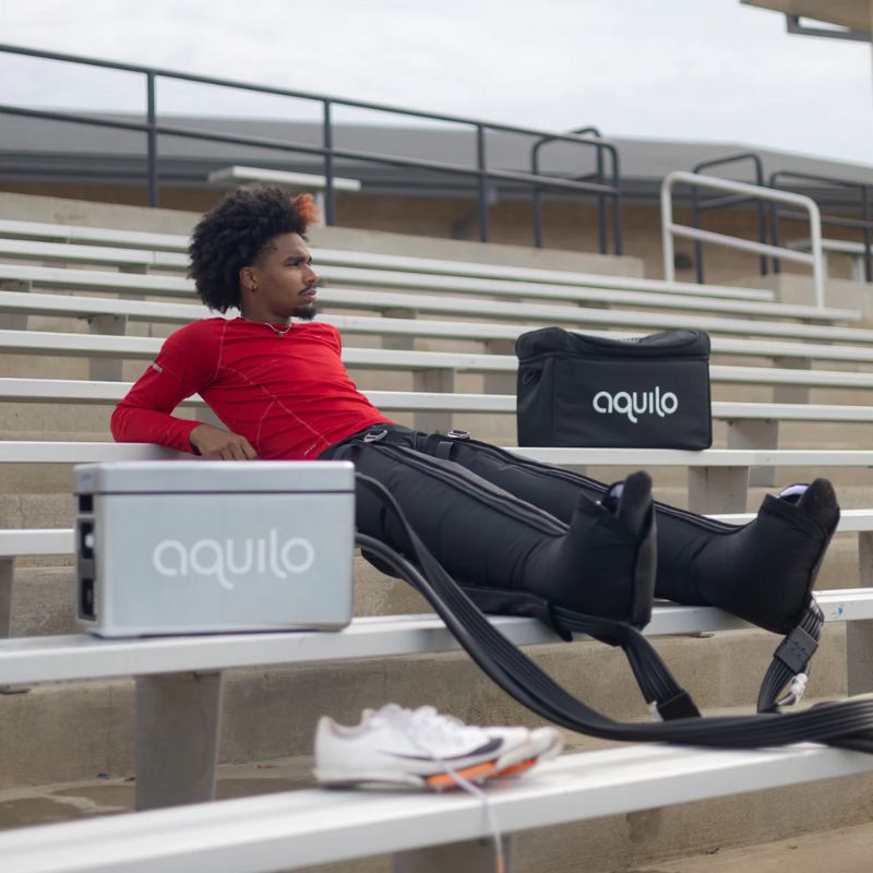 AquiloSportsCCT1500SystemInBlackColourWithAthleteUsingThemOutdoor