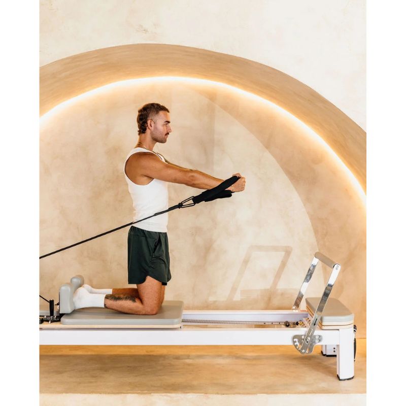 AussiePilatesDefineAP-AL-22ReformerInGreyColourwithMaleUsingIt