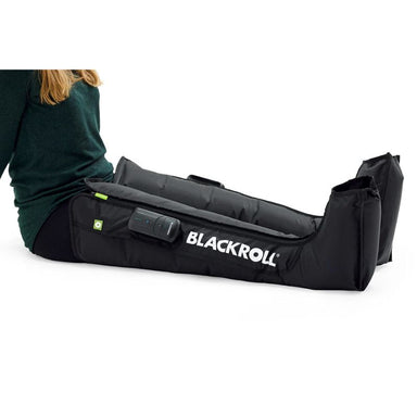 BLACKROLL Compression Boots 2.0 In Black Colour with Person Using It