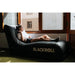 BLACKROLL Portable Inflatable Air Lounger 2.0 with female using it while resting