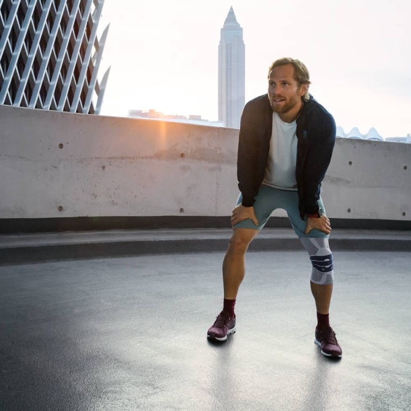 Bauefeind Genutrain Knee Brace in Titan Colour Worn While Running