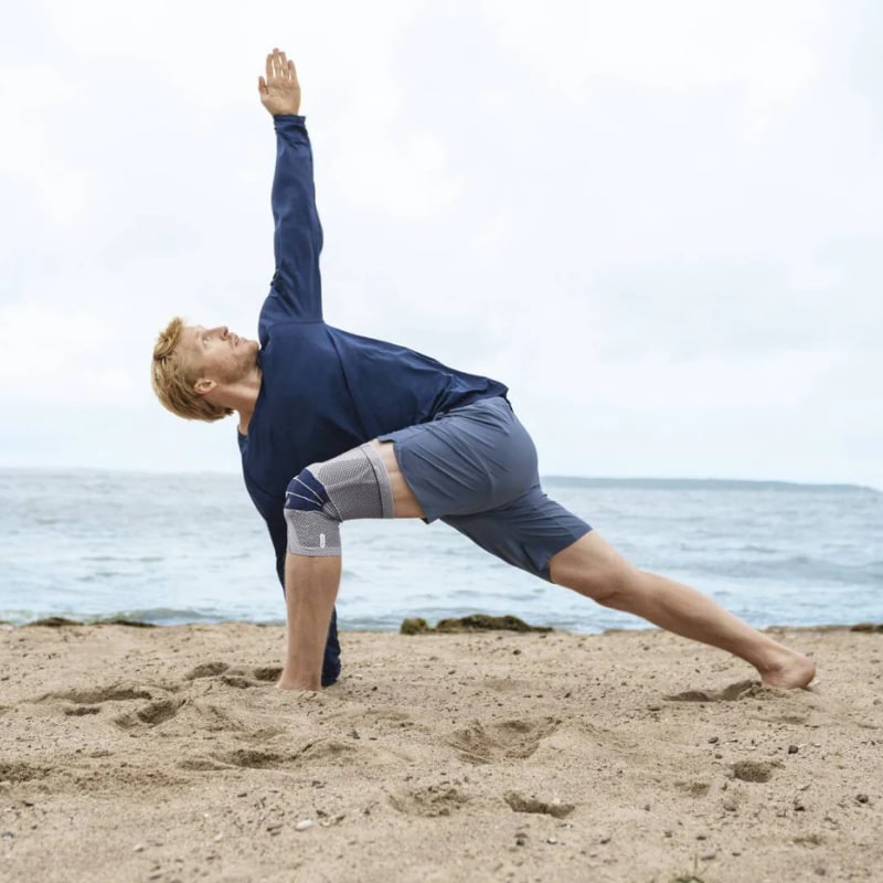 Bauefeind Genutrain Knee Brace in Titan Colour Worn While Doing Yoga