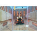 Innerlight 8 Person Seated Full Spectrum Infrared Hot Yoga Sauna with female inside doing yoga