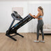 Lifespan Fitness Apex Smart Treadmill with Female Moving It