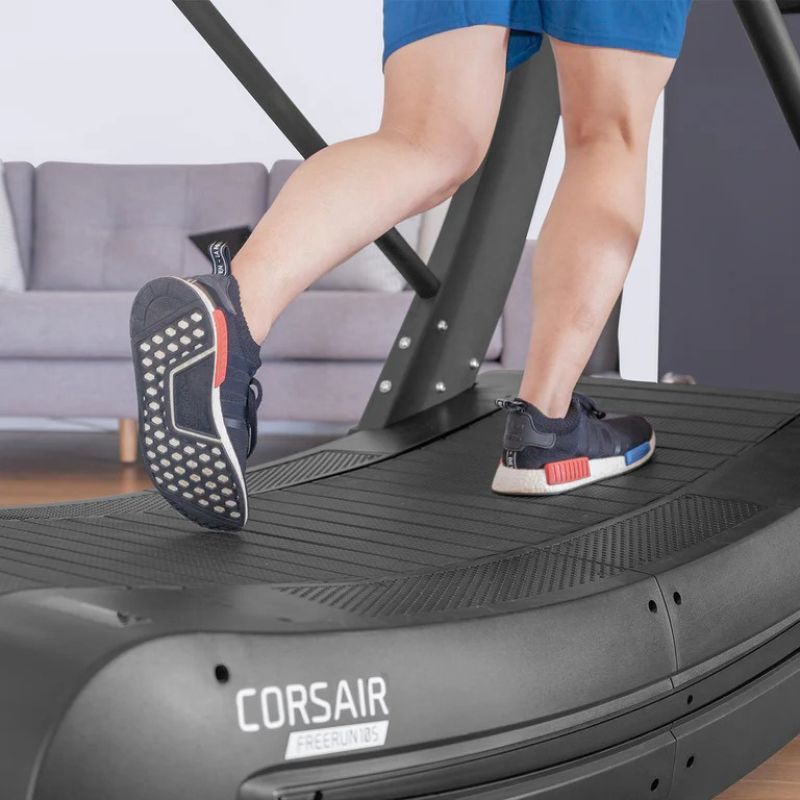 Lifespan Fitness Corsair FreeRun 105 Curved Treadmill Closer Look of the Walk Pad with Male Using It