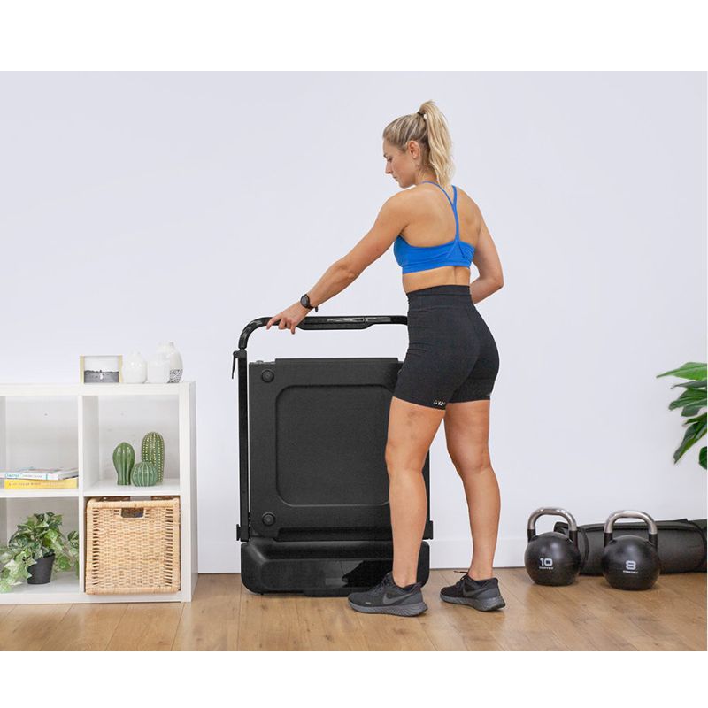 Lifespan Fitness V-FOLD with SmartStride Folding Treadmill with Woman Storing After Using