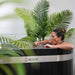 NUVIE Fusion Hybrid Barrel Sauna & Ember Dual Ice Bath Bundle with woman using the tub