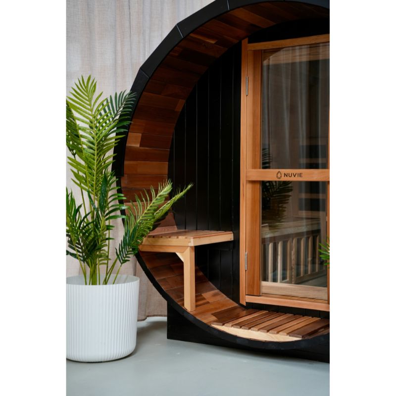 NUVIE Fusion 6–8 Person Hybrid Barrel Sauna Closer Look of bench outside in outdoor location