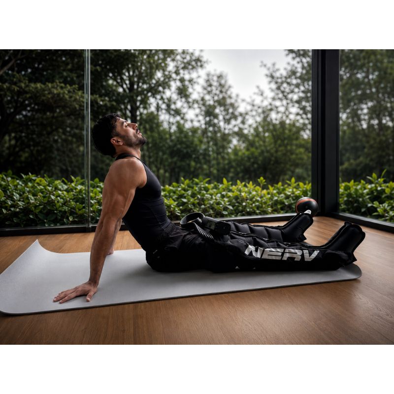 NERV Squeeze Compression Boots with man sitting and using it