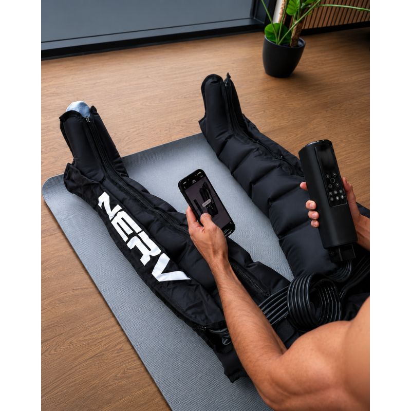 NERV Squeeze Compression Boots with man using it