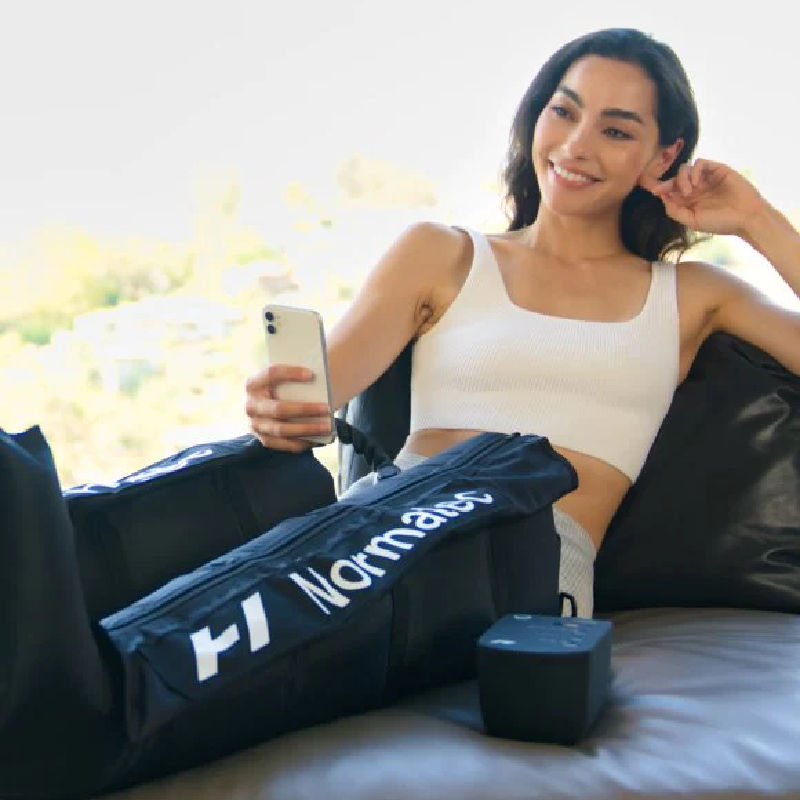 Normatec 3 Lower Body Compression Boots Used By Woman