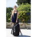 Nubis NubisLite Pneumatic Massage Table with Woman Carrying the Travel bag