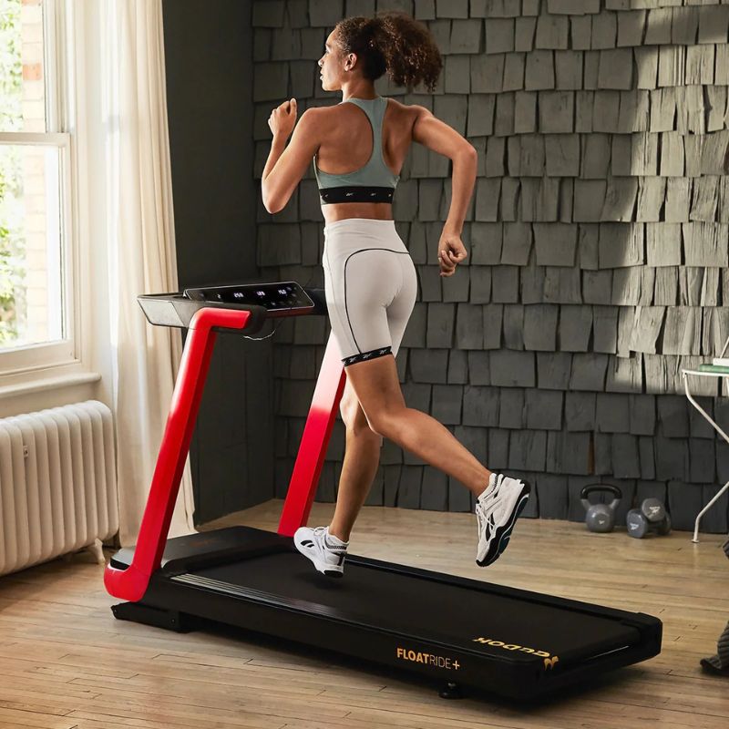 Reebok FR20z Floatride Treadmill with Woman Running at Side View