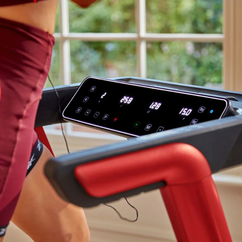 Reebok FR20z Floatride Treadmill with Woman Running and Look of the Controls