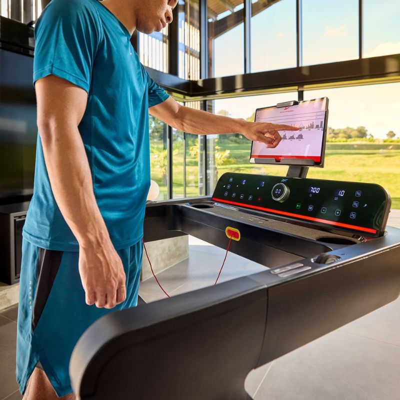 Reebok Z-Tech Treadmill with Man using the Screen and Controls