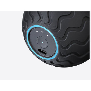 TherabodyWaveSoloVibrationTherapyBallInBlackColourButtonandChargingPortCloserLook
